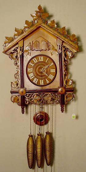 G H S wooden cuckoo & quail hanging clock: — Antique Clocks Price Guide
