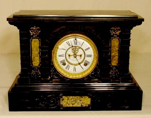 Ansonia iron case mantle clock: — Antique Clocks Price Guide