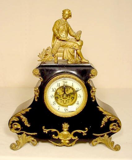 Waterbury iron case statue clock: — Antique Clocks Price Guide
