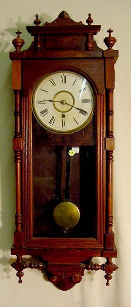 Ansonia Queen Elizabeth walnut wall clock: — Antique Clocks Price Guide