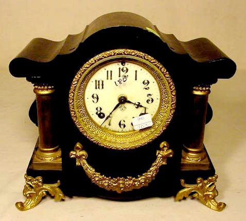 Ansonia iron case mantle clock: — Antique Clocks Price Guide