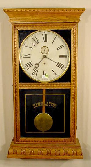 Gilbert Observatory oak regulator: — Antique Clocks Price Guide
