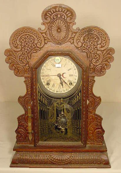 Ingraham Gila oak calendar shelf clock. — Antique Clocks Price Guide