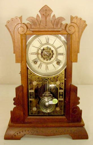 Waterbury walnut shelf clock with alarm: — Antique Clocks Price Guide