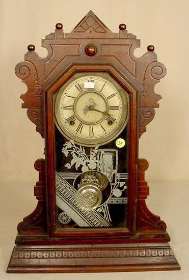 Waterbury walnut shelf clock: — Antique Clocks Price Guide
