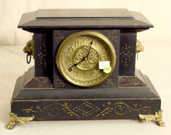 Black mantle clock: maker not identified; — Antique Clocks Price Guide