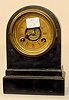 Early Terry iron case alarm clock: