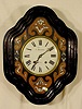 C. Beucher inlaid hanging clock: 