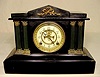 Ansonia iron case column clock: 