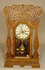 Pressed oak parlor clock.