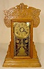Gilbert pressed oak kitchen clock.
