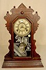 Waterbury walnut shelf clock: