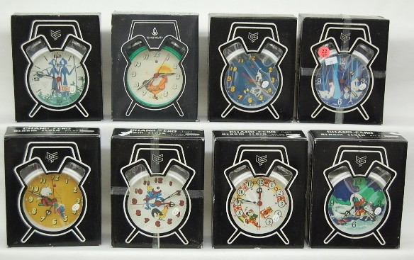 Group of 8 Chang-Feng Animated Alarm Clocks — Antique Clocks Price Guide