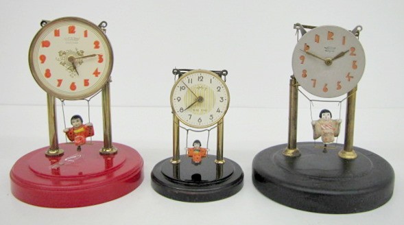 3 Oriental Swinger Dome Clocks — Antique Clocks Price Guide