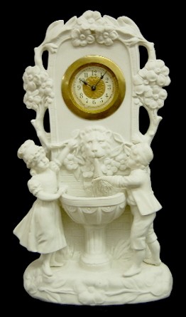 DEP Antique Bisque Children Fountain Clock — Antique Clocks Price Guide