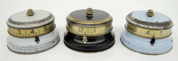 Group of 3 Miniature Metal Tape Measure Clocks — Antique Clocks Price Guide