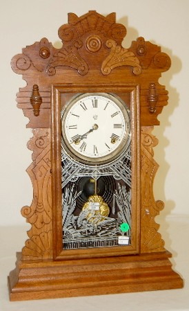 Waterbury "Gibson" Walnut Carved Kitchen Clock — Antique Clocks Price Guide