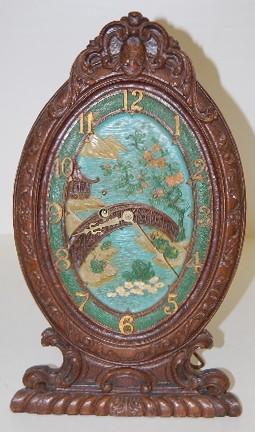 Unmarked Carved Wood Oriental Oval Clock — Antique Clocks Price Guide