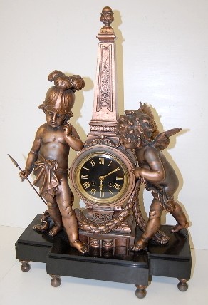 French Marble and Bronze Cherub Statue Clock — Antique Clocks Price Guide