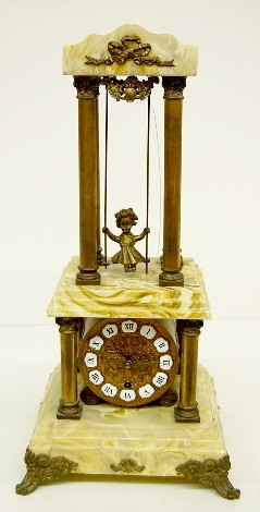 Ornate Marble Swinging Doll Mystery Clock — Antique Clocks Price Guide