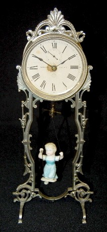 Ansonia Bouncing Doll Clock — Antique Clocks Price Guide