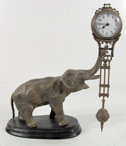 Junghans Bronze Elephant Swinger Clock — Antique Clocks Price Guide