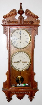 Oak Waterbury No. 33 Double Dial Calendar Clock — Antique Clocks Price Guide