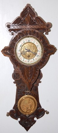 Gustav Becker Chip Carved Free Swinger Clock — Antique Clocks Price Guide