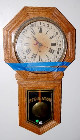 Sessions Oak Calendar Schoolhouse Clock — Antique Clocks Price Guide