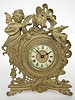 Ansonia Cherub and Bird Metal Novelty Clock