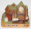 Lux Carved Figural Flour Mill Clock
