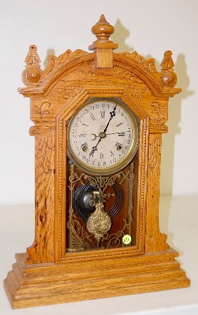 Waterbury Oak Calendar Clock — Antique Clocks Price Guide