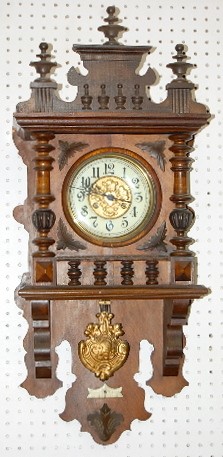 German Carved Free Swinger Wall Clock — Antique Clocks Price Guide