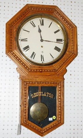 Gilbert Consort Oak Carved Schoolhouse Clock — Antique Clocks Price Guide