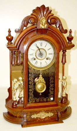 Walnut New Haven "Occidental" Parlor Clock — Antique Clocks Price Guide