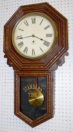 New Haven Carved Oak Schoolhouse Clock — Antique Clocks Price Guide