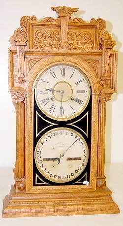 Oak Waterbury No. 43 Double Dial Calendar Clock — Antique Clocks Price Guide