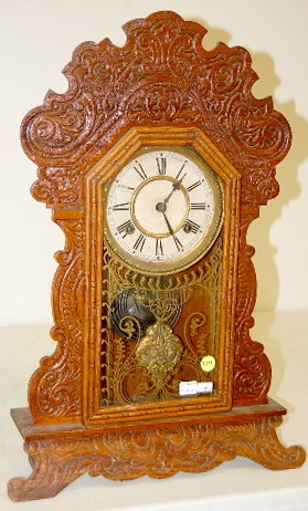 Waterbury "Festus" Pressed Oak Kitchen Clock — Antique Clocks Price Guide
