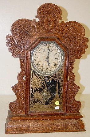 Pressed Oak Ingraham "Gila" Calendar Clock — Antique Clocks Price Guide
