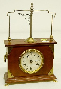 Jerome and Co. Swinging Ball Clock — Antique Clocks Price Guide