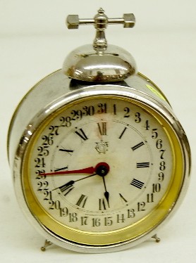 Waterbury Calendar Dial Bell Top Alarm Clock — Antique Clocks Price Guide