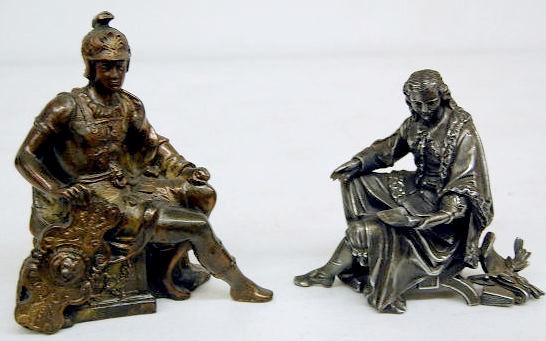 2 Seated Male Metal Clock Statues — Antique Clocks Price Guide