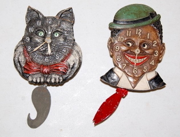 2 Animated Eye Wall Clocks: — Antique Clocks Price Guide