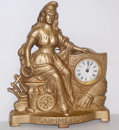 Metal Figural Novelty "Commerce" — Antique Clocks Price Guide