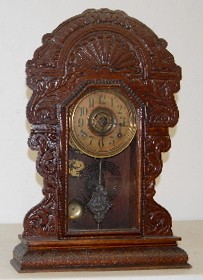 Sessions Dolphin Oak Kitchen Clock w/ Alarm — Antique Clocks Price Guide