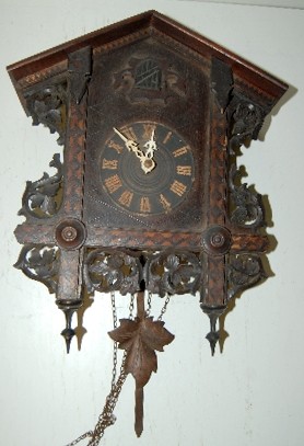 Antique Inlaid and Carved Cuckoo Clock — Antique Clocks Price Guide
