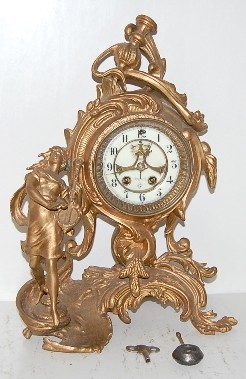 Metal Lady Figural Novelty Clock — Antique Clocks Price Guide