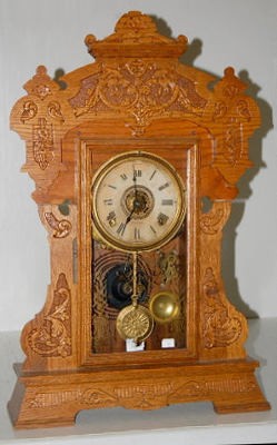 Seth Thomas Large Oak Kitchen Clock With Griffins — Antique Clocks Price Guide