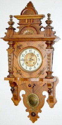 Antique Walnut Free Swinger Wall Clock — Antique Clocks Price Guide