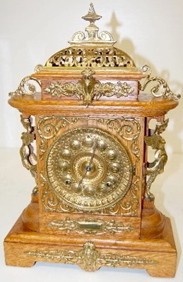 Ansonia Cabinet "E" Clock, Oak W/ Metal Trim — Antique Clocks Price Guide